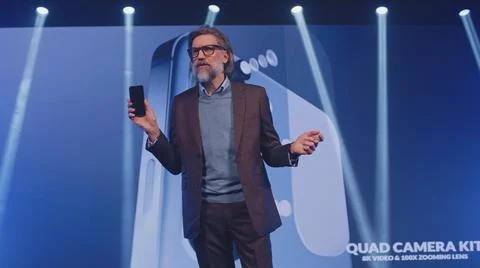 The developer presenting a new modern device Stock Photos