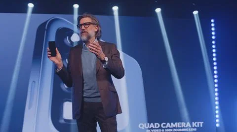 The developer presenting a new modern device Stock Photos