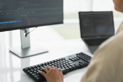 Developer programmer programming code to developing website and application.. Stock Photos