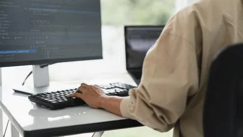 Developer programmer programming code to developing website and application.. 写真素材