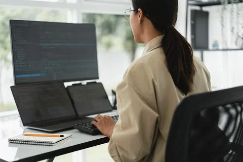 Developer programmer working about programming code to developing web and a.. Stock Photos