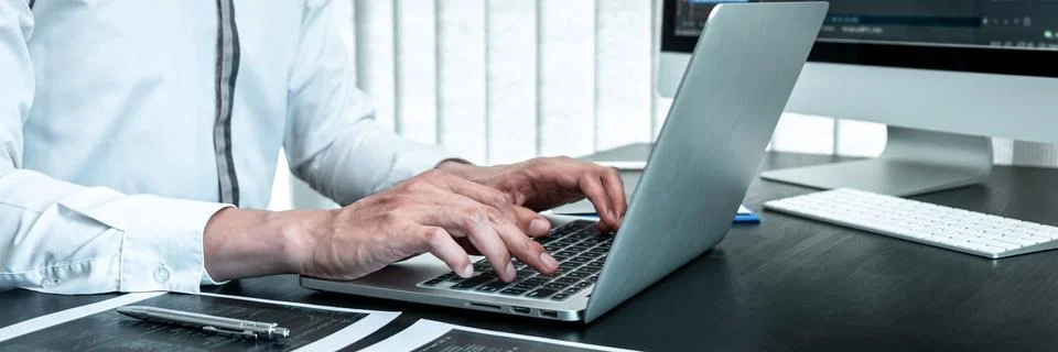 Developer programmer working on coding program software computer in office, W Stockfoto's