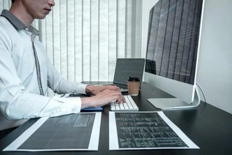 Developer programmer working on coding program software computer in office, W Foto stock