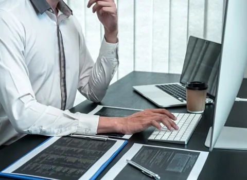Developer programmer working on coding program software computer in office, W 스톡 사진