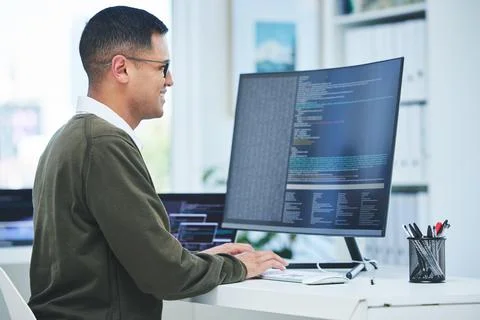 Developer, programming and a man at computer for coding, software script or Stock Photos
