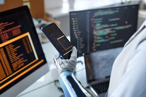 Developer with Prosthetic Arm Testing App 库存照片