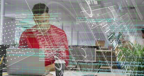 Developer in red sweater typing at desk, starting green HUD flagging code, Stock Footage 330355907