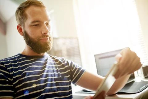 Developer, research or man on tablet in startup office for software system .. Foto stock
