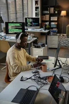 Developer Reviewing Programming Code Stock Photos