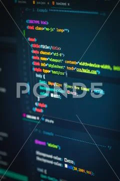Developer screen with colored website programming code Stock Photos