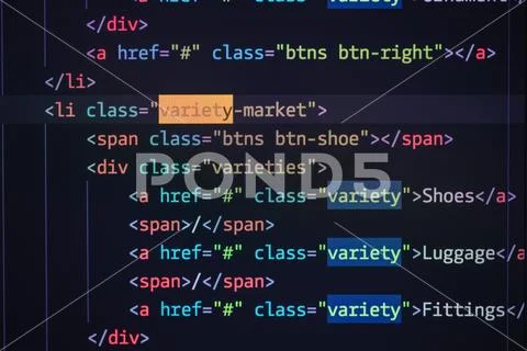 Developer screen with colored website programming code Stock Photos