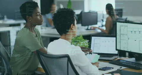 Developer scrolling code grabbing sticky notes while designer guiding cursor on Stock Footage 315543814