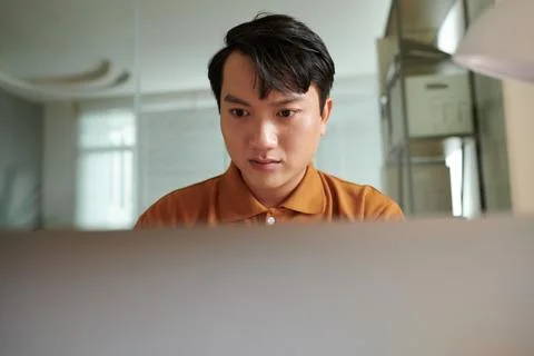 Developer Searching for Bugs in Code 스톡 사진