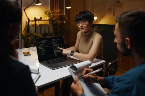 Developer Showing Programming Code Stockfoto's