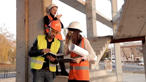 The developer shows his clients how the design of their object is moving Stock Footage 97807950