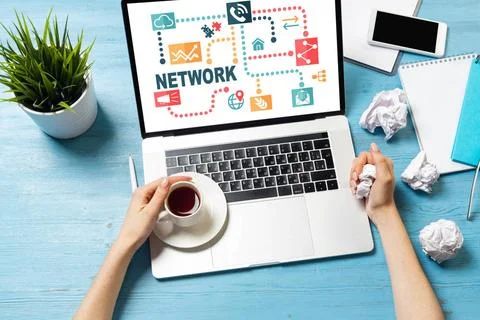 Developer sitting at desk and working with laptop Developer sitting at des... Stock Photos