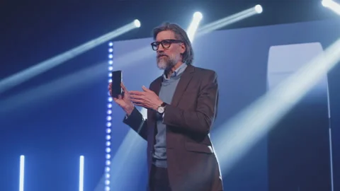 The developer talking about the new phone model Stock Footage 169715692