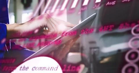 Developer tapping tablet screen in office, generating magenta code overlay while Stockfoto's