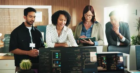 Developer, team and computer with business people in office for database, m.. Stock Photos