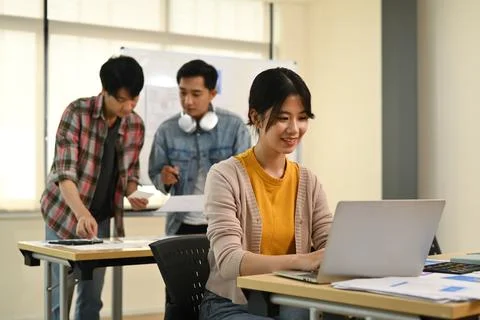 Developer team collaborating and planning template layout for mobile application Stock Photos