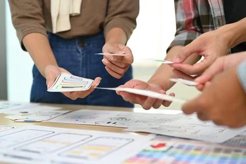 Developer team working on development project for mobile application at creative Stock Photos