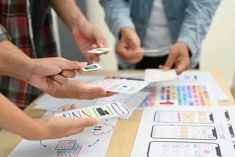 Developer team working on development project for mobile application at creative Stock Photos