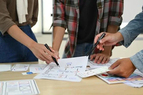 Developer team working on development project for mobile application at creative Stock Photos