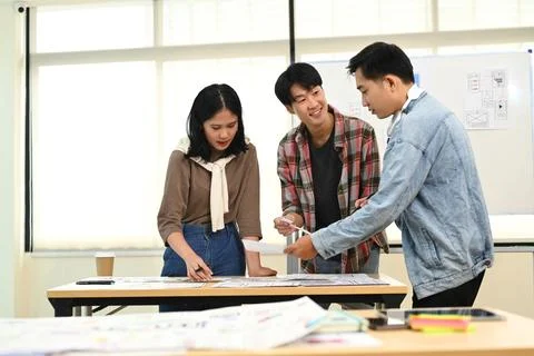 Developer team working on development project for mobile application at creative Stock Photos