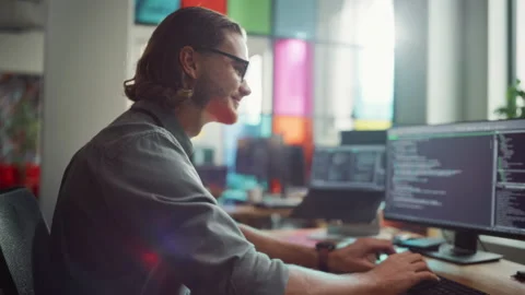 Developer Thinking And Writing Code in Office Stock Footage 223191314