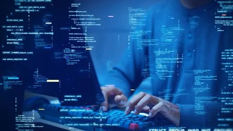 A developer types on a computer with glowing code and binary symbols overla.. Stock-Fotos