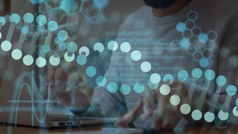 Developer typing code animating hexagonal DNA charts for data analysis while Stock Footage 318476182