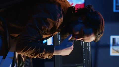 Developer typing code in home office to develop software application Stock Footage 265109045