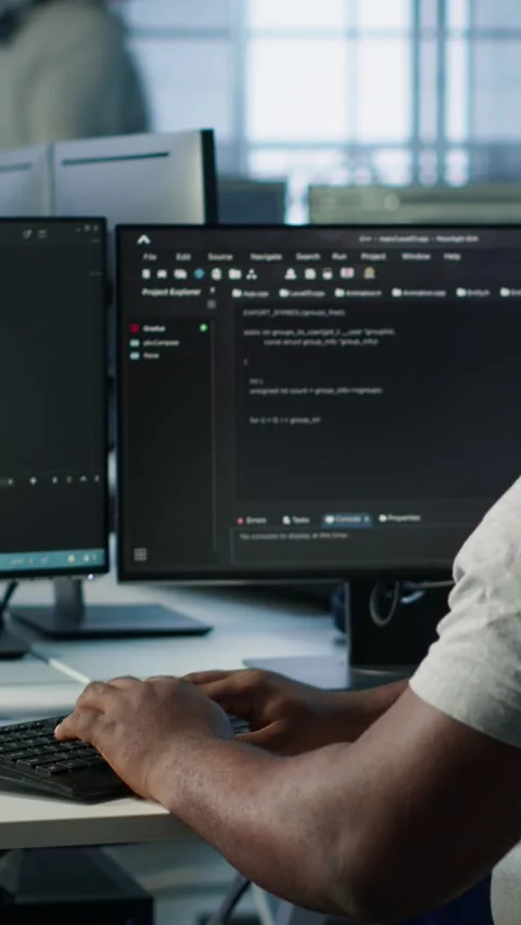 Developer typing code on PC to mend data center racks Stock Footage 319566266