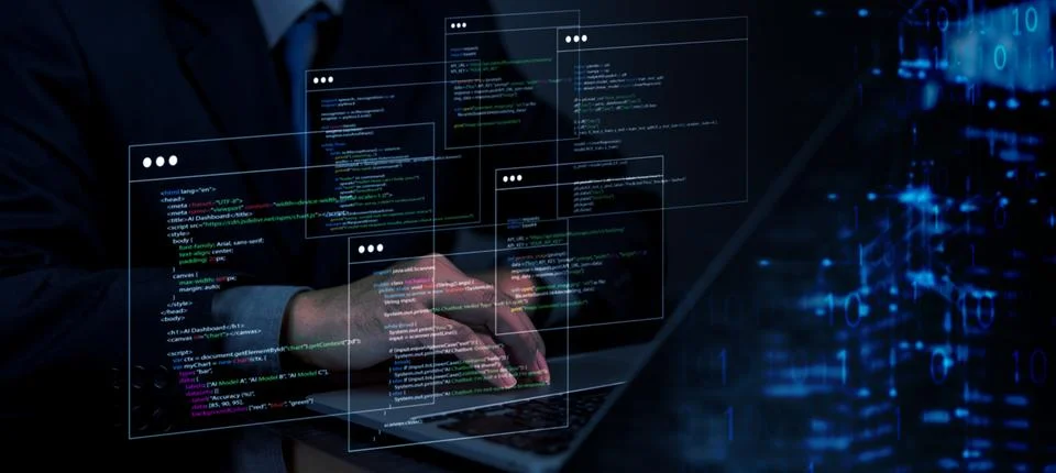 A developer is typing on a laptop, coding with AI chatbot commands. The fut.. 스톡 사진
