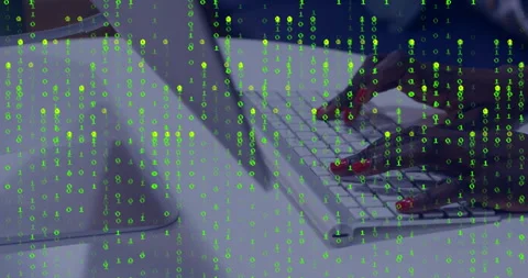Developer typing on laptop keyboard in technology workspace, showing floating Stock Footage 307462605