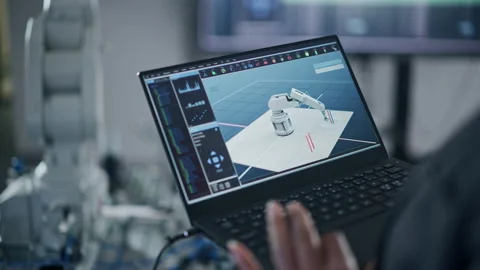 Developer Typing At Laptop Keyboard While Programming Stock Footage 182947213