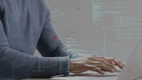 Developer typing then pointing on laptop, activating overlays over hands while Stock Footage 335282093