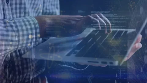 Developer typing then using trackpad while stabilizing laptop, showing code HUD Stock Footage 326993876