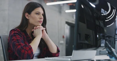 Developer using laptop computer while writing programming code at modern crea Stock Footage 113957980