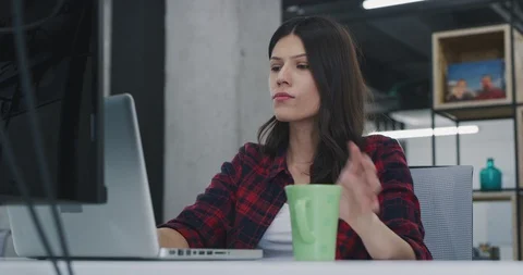 Developer using laptop computer while writing programming code at modern crea Stock Footage 113959426