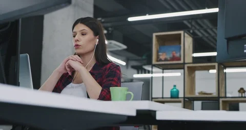 Developer using laptop computer while writing programming code at modern crea Stock Footage 113961317