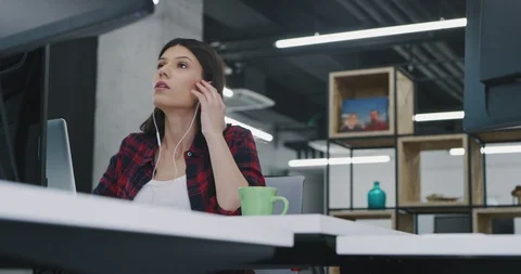 Developer using laptop computer while writing programming code at modern crea Stock Footage 113963298