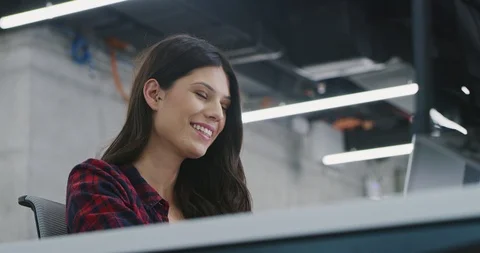 Developer using laptop computer while writing programming code at modern crea Stock Footage 114102777