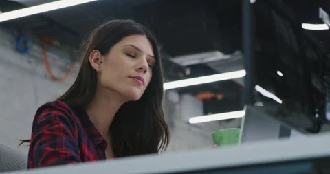 Developer using laptop computer while writing programming code at modern crea Stock Footage 114191697