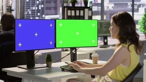 Developer using multi monitor isolated screen PC in office Stock Footage 318159509