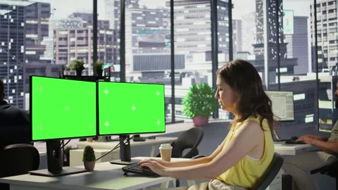 Developer using multi monitor isolated screen PC in office Stock Footage 318161356