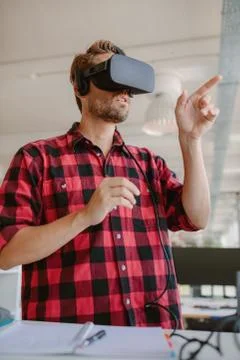 Developer using virtual reality simulator headset Stock Photos