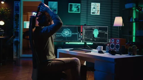 Developer using VR headset panicking after sentient AI gains autonomy Stock Footage 267046774