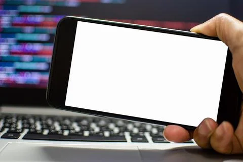 The developer wants to run an app on the smartphone device after coding fro.. Foto stock