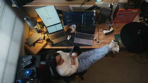 Developer Wearing Glove Tossing Ball at Tech Workspace Stock Footage 338422294